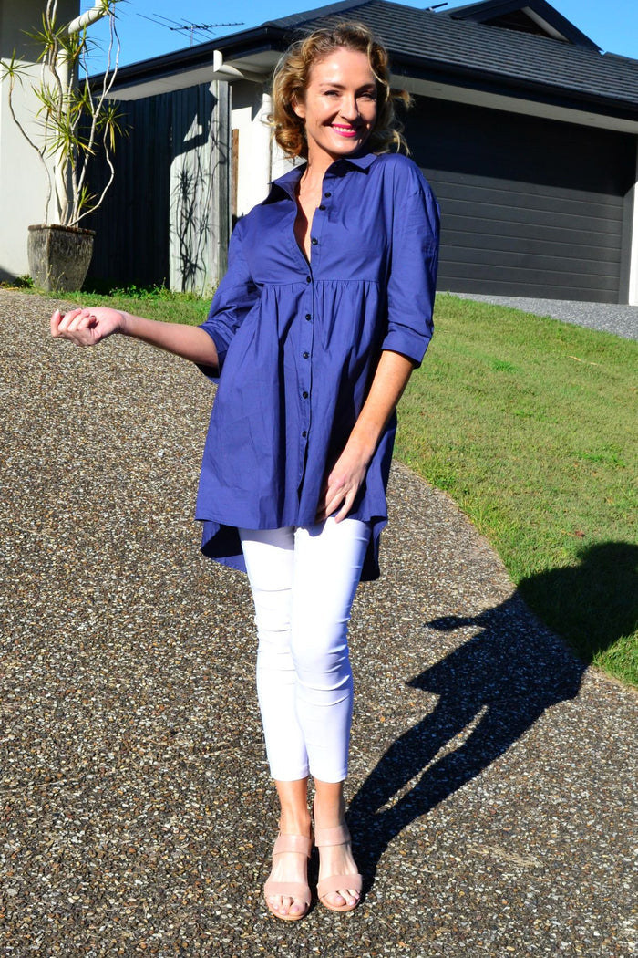 Steel blue Hourglass tunic shirt for women, stylish and trendy, shown on a model with long sleeves and a relaxed fit.