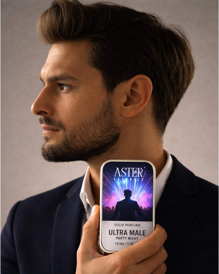 Man holding a phone with Aster Ultra Male solid perfume packaging