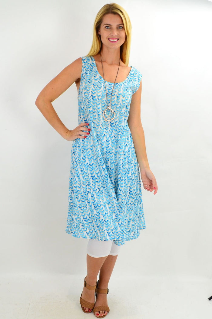 Aqua sleeveless boomerang A-line shift tunic dress by Cordelia St, featuring a relaxed fit and casual style.