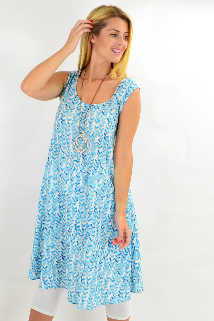 Aqua blue sleeveless boomerang A-line shift tunic dress by Cordelia St, featuring a relaxed fit and simple neckline.