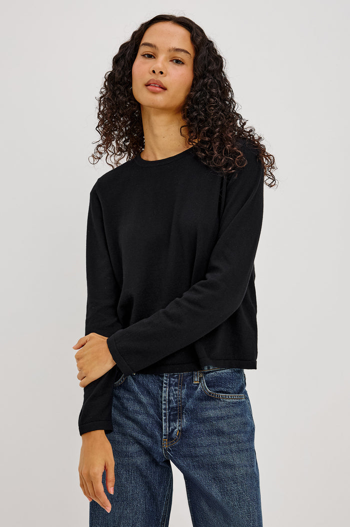 Cotton Cashmere Long Sleeve T-Shirt With Crewneck, Long Sleeve, Slightly Cropped Fit in Black Colorway - Upper Body Front View Featured on Model