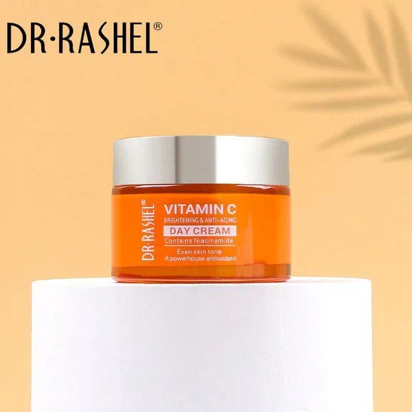 Dr. Rashel Vitamin C day cream jar on a white pedestal with a yellow background
