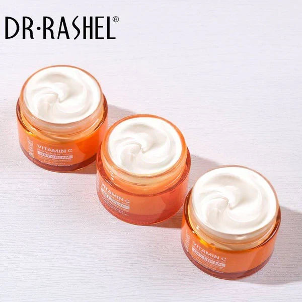 Three jars of Dr. Rashel Vitamin C cream on a white background