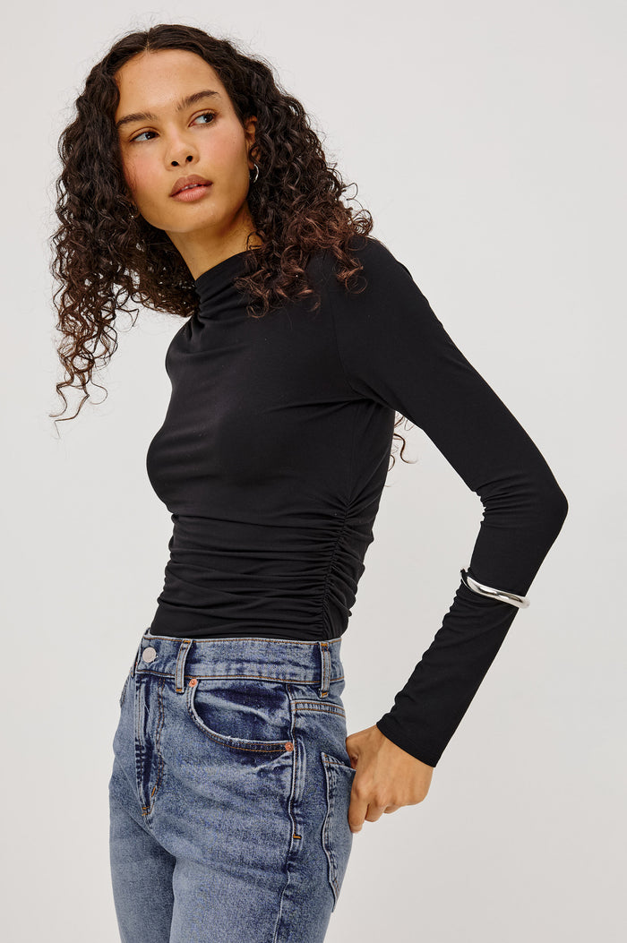 Joelle Top in Soft Jersey With High Funnel Neckline, Long Sleeves, Self-Lined Body, and Asymmetric Ruching at Shoulder and Waist in Black Colorway - Upper Body Front View Featured on Model