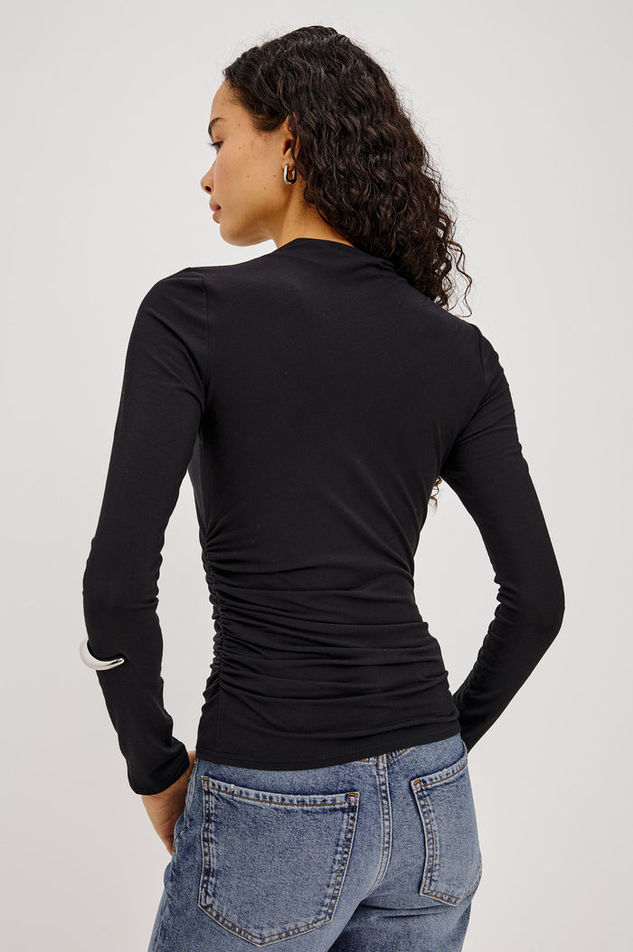 Joelle Top in Soft Jersey With High Funnel Neckline, Long Sleeves, Self-Lined Body, and Asymmetric Ruching at Shoulder and Waist in Black Colorway - Upper Body Back View Featured on Model