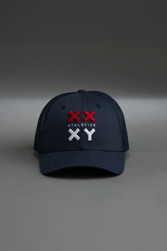 Navy blue cap with red and white logo on a gray background || navy with red & white logo