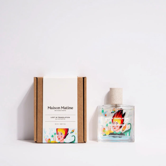 Perfume bottle and packaging with 'Maison Matine' branding on a white background