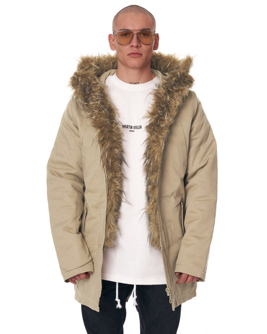Martin Valen beige parka-style jacket with furry trim, front view with hood open and logo visible on the T-shirt.