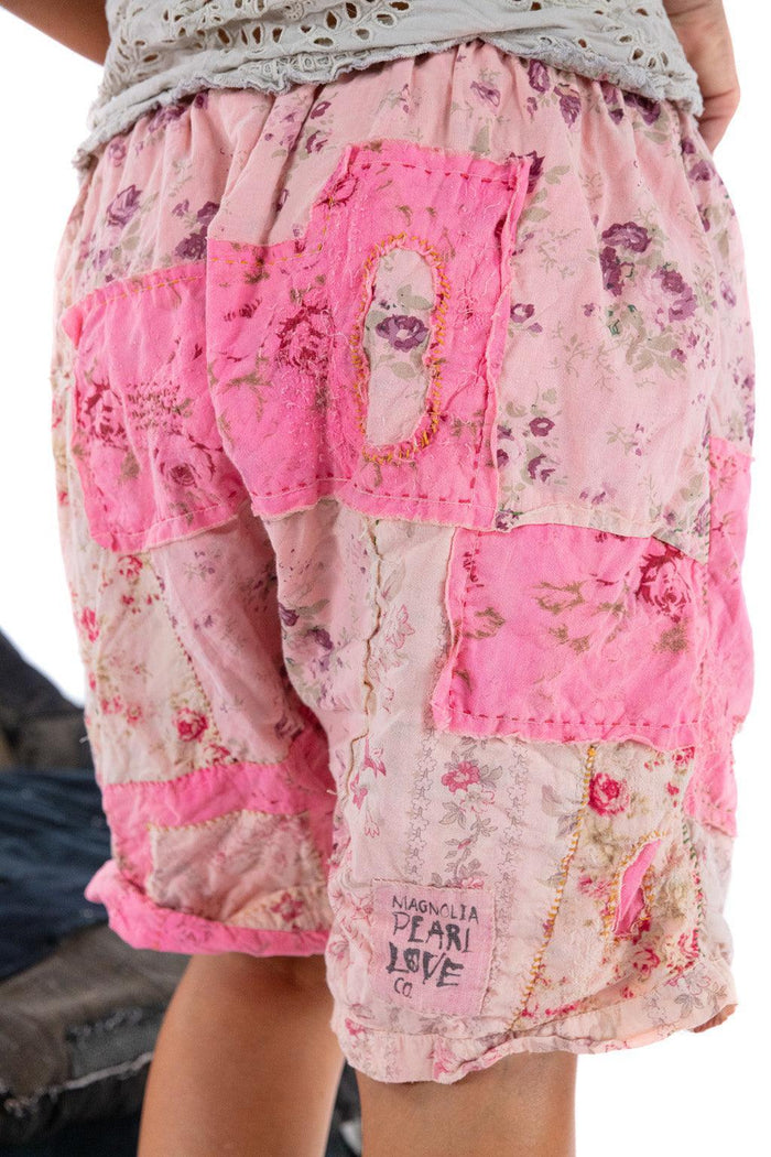 Magnolia Pearl pink patchwork artisan shorts with floral vintage-inspired whimsical design