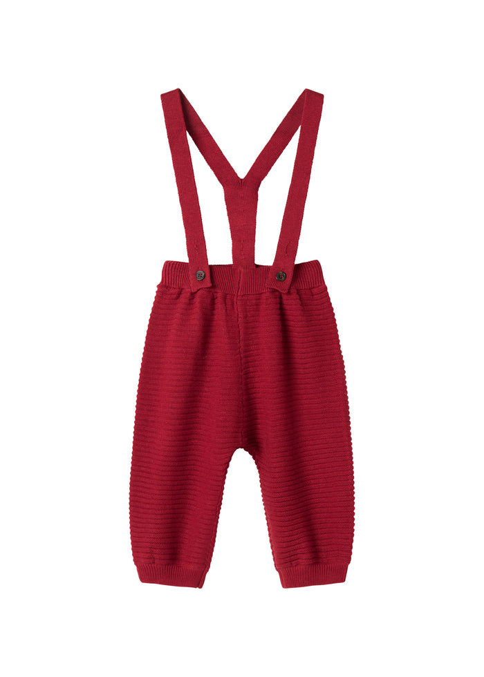 Red knitted pants with suspenders and pretty buttons for baby