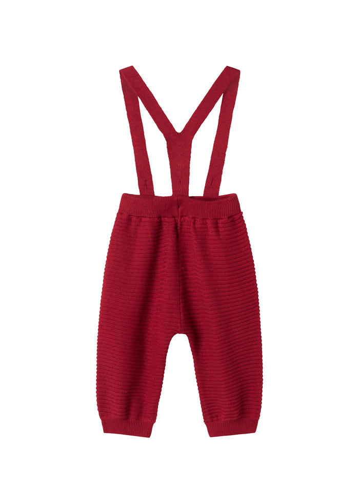 Red knitted pants with suspenders and pretty buttons for baby