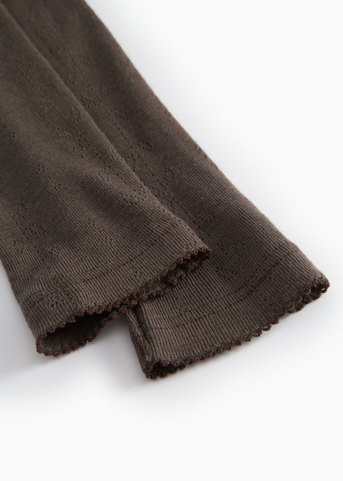 Uld leggings i mørk Terre med pointelle-væv og smal kant ved benåbning