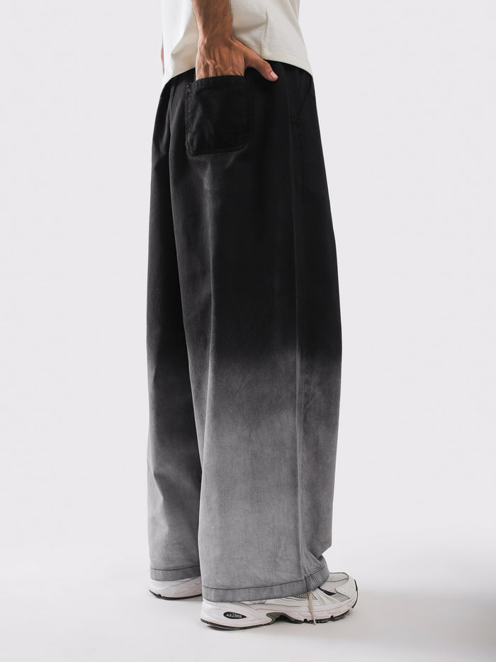Female model wearing gradient wash baggy trousers - GROOVY Pakistan